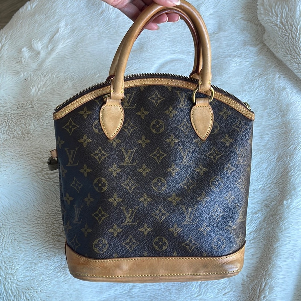 Authentic vintage Luis Vuitton with lock